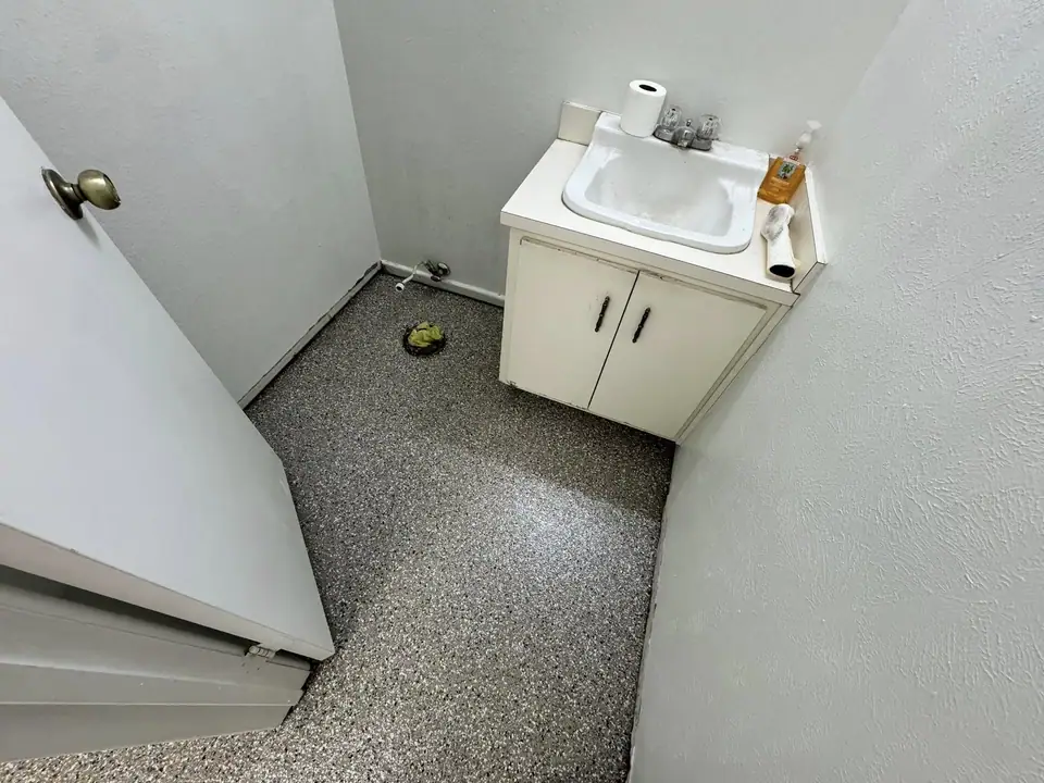 Bathroom floor concrete coating project in Seminole, TX