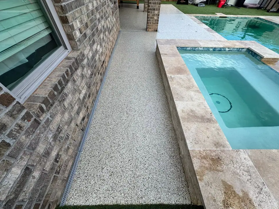 Poolside patio after concrete coating